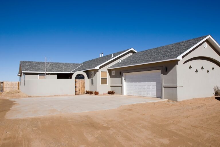 exterior shot of new house for sale. limited landscaping