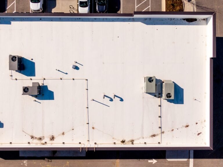 Sunny Day Time Drone Images of New TPO Roofing System on a New Commercial Building in Raleigh North Carolina: No People, Engineering, Architecture, Trades