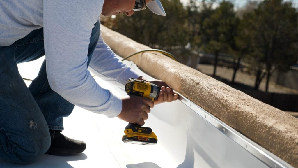Cabezon roofing worker on commercial roof