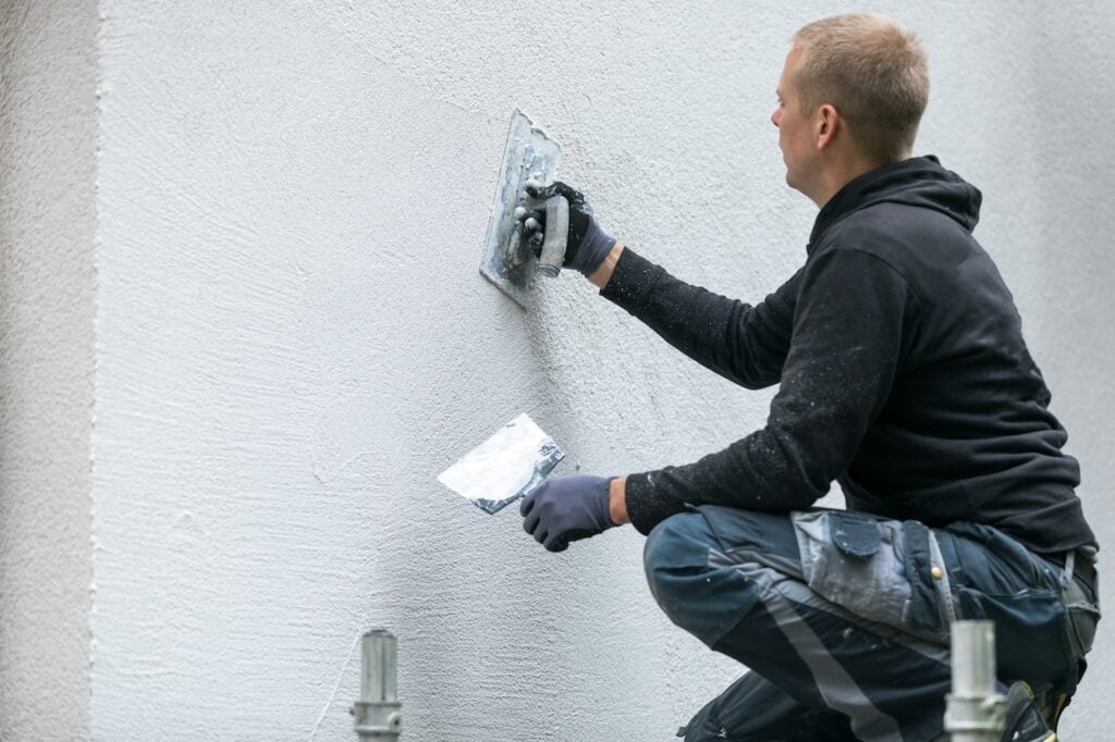adding synthetic stucco to home