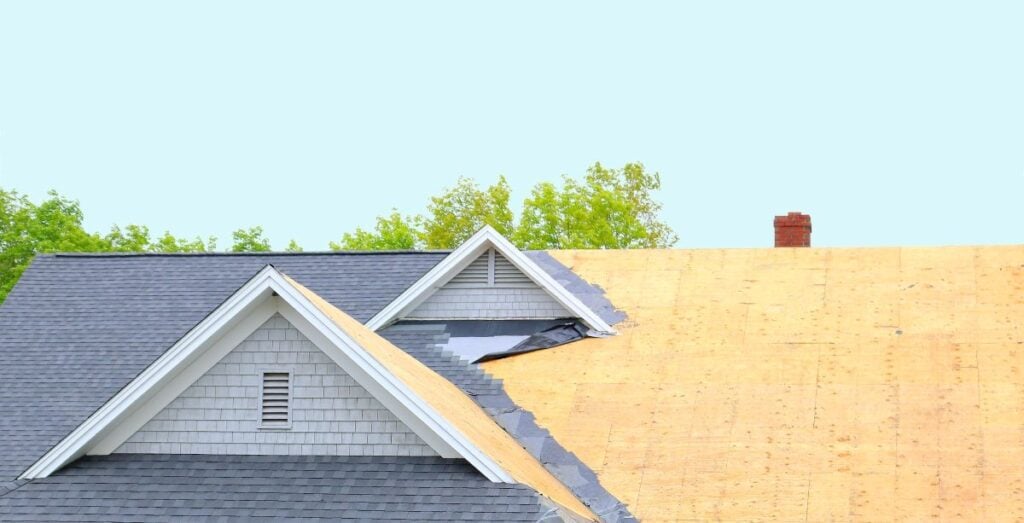 asphalt shingle roof being replaced